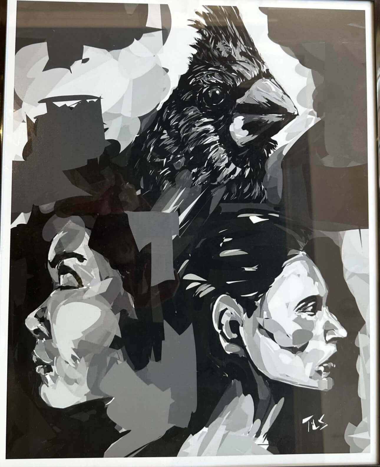 two face staring in opposite directions and a bird overtop of them