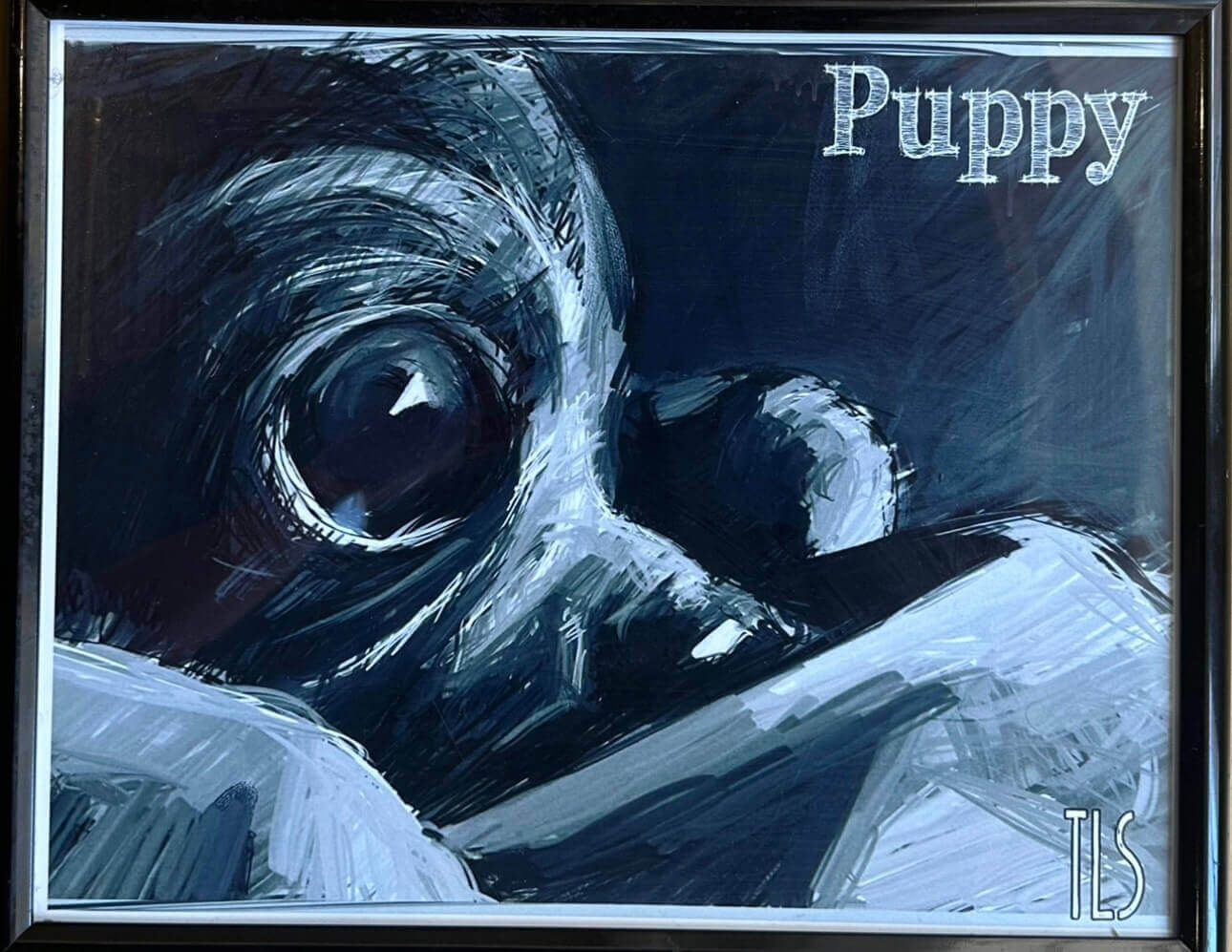 A Digital Photo of a Puppy looking off